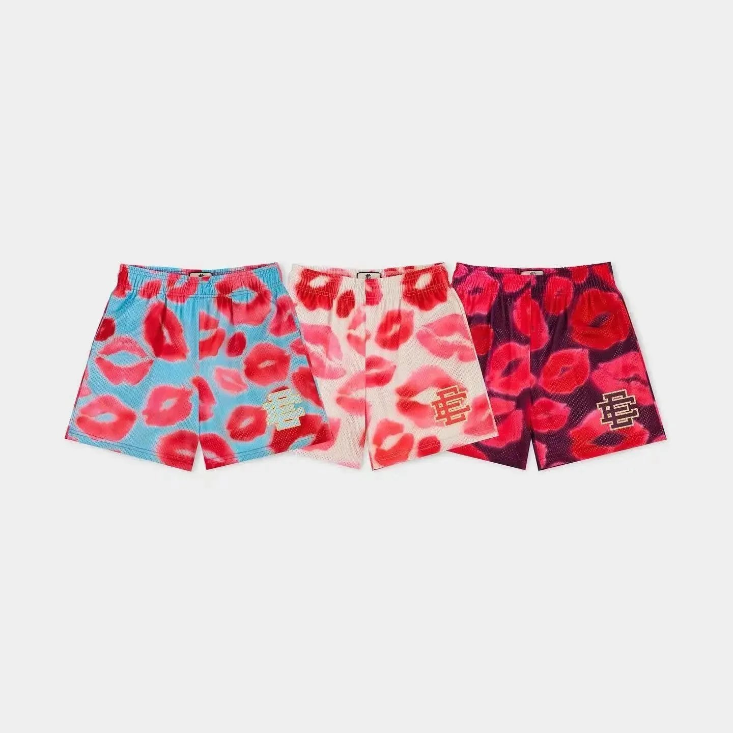 Cult Gaia Lip Print Mesh Shorts in Blue, Pink, and Red