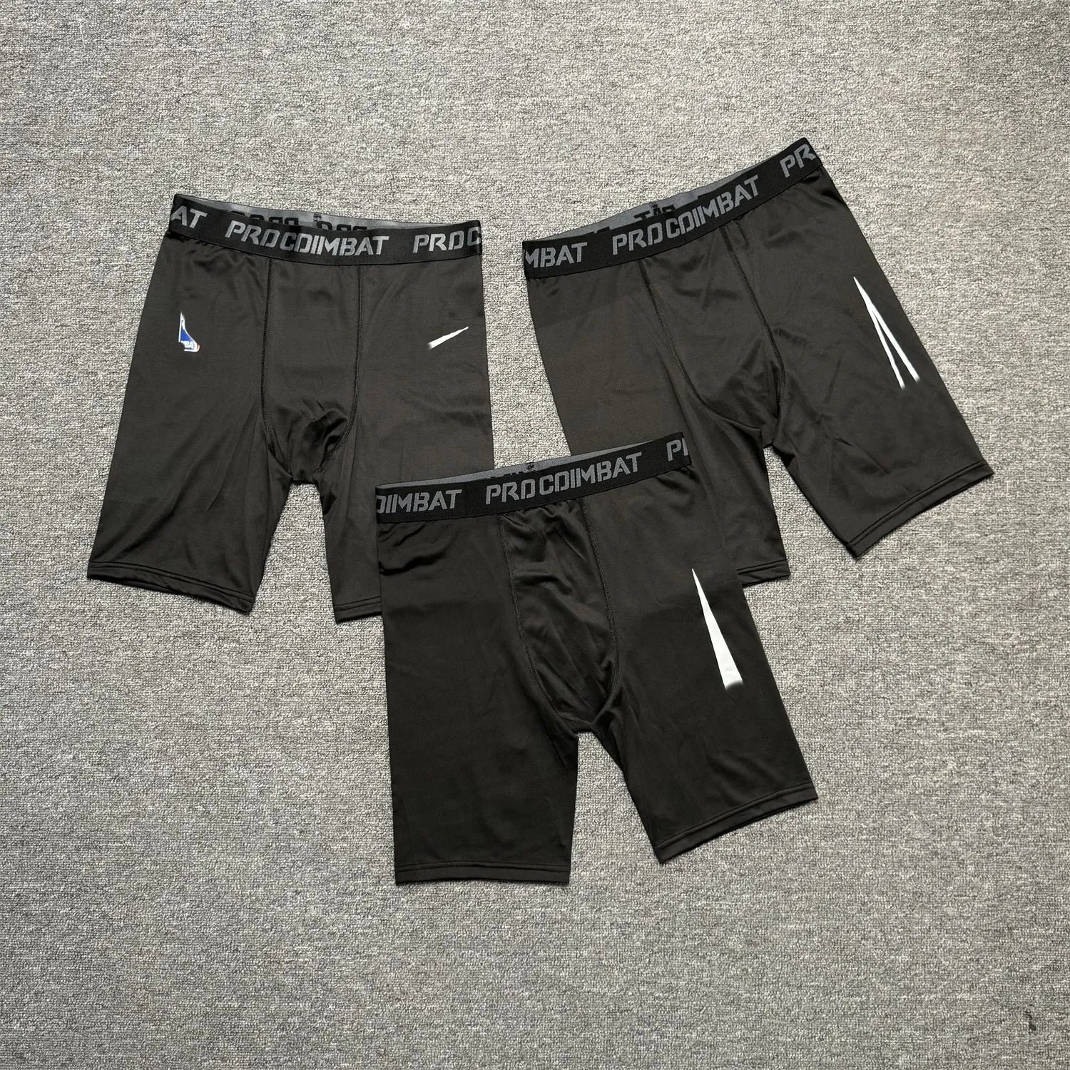 PROCOIMBAT Men's Compression Shorts for Workout and Sports Training