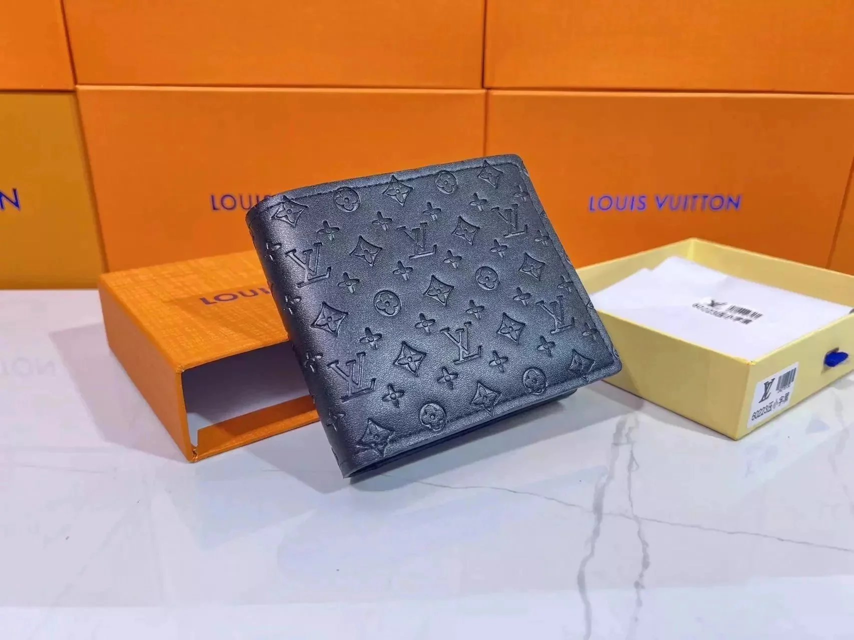 Louis Vuitton Monogram Embossed Leather Wallet for Men
