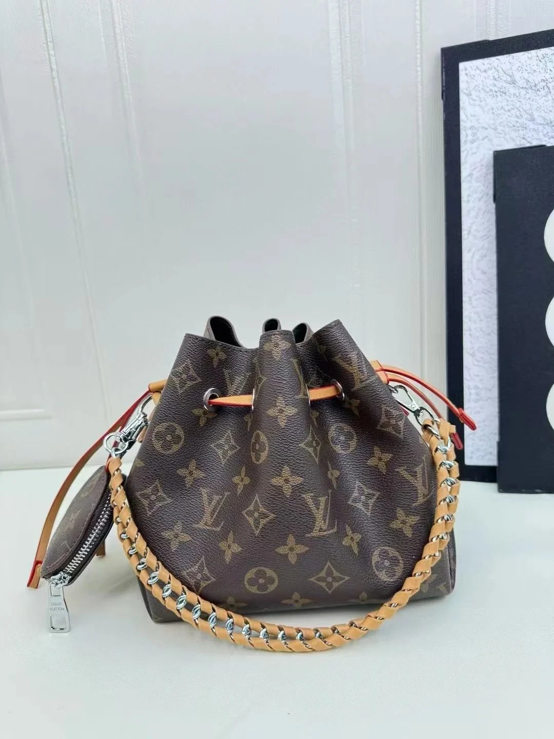 Louis Vuitton Monogram Drawstring Bag with Chain Strap