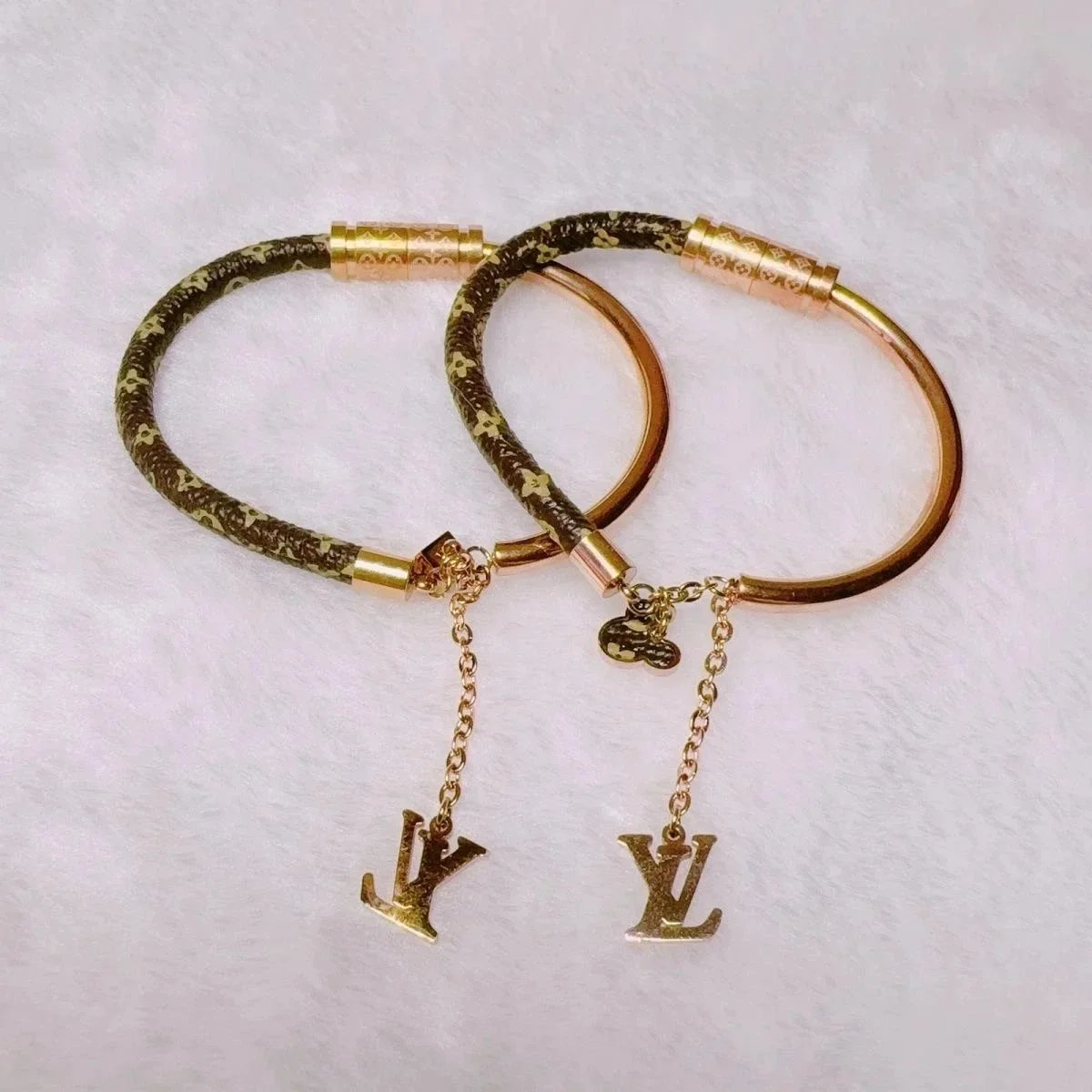Louis Vuitton Monogram Bracelet with LV Charm Gold Tone