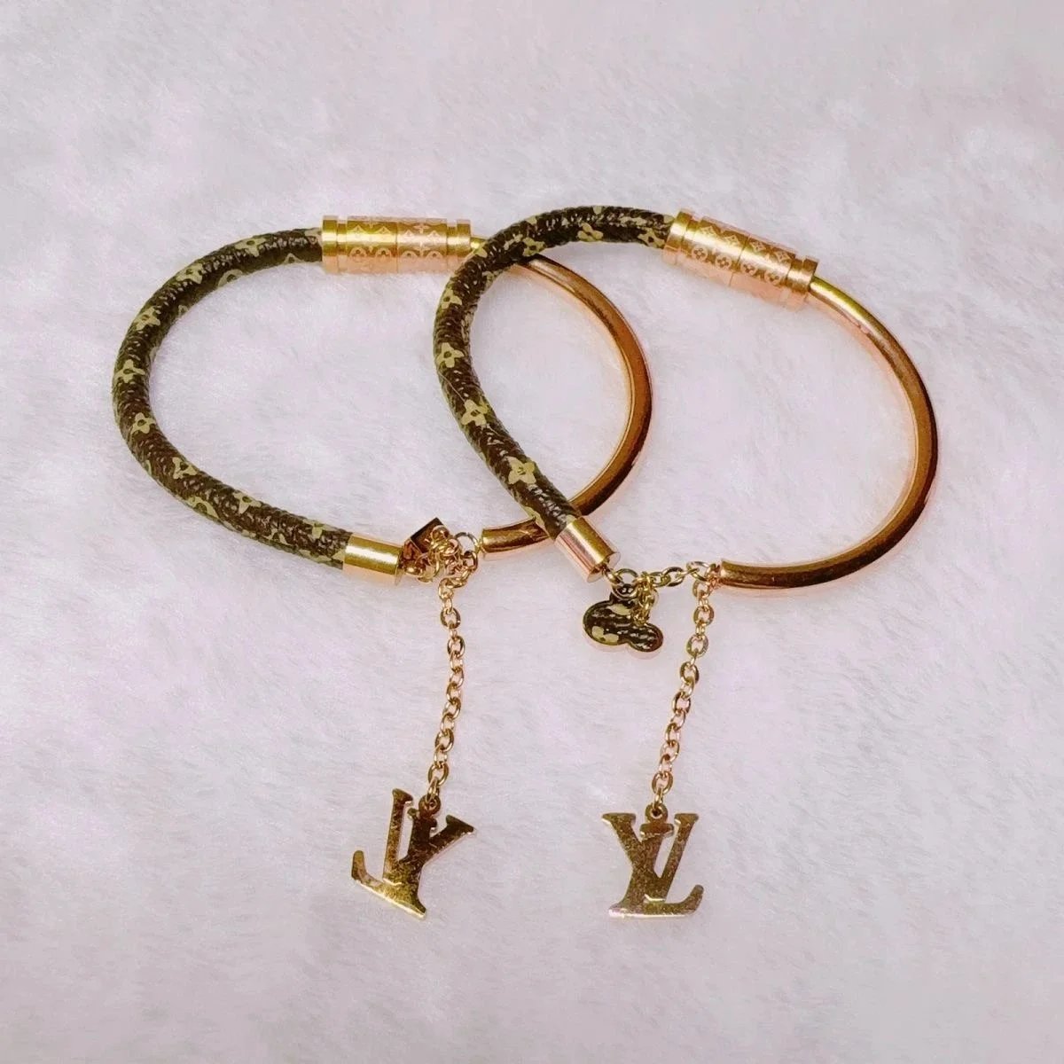Louis Vuitton Monogram Bracelet with LV Charm Gold Tone