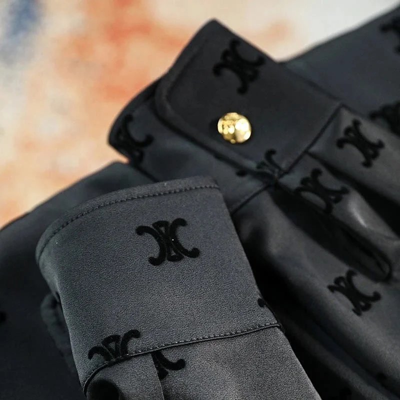 XK Monogram Pattern Black Jacket with Gold Buttons