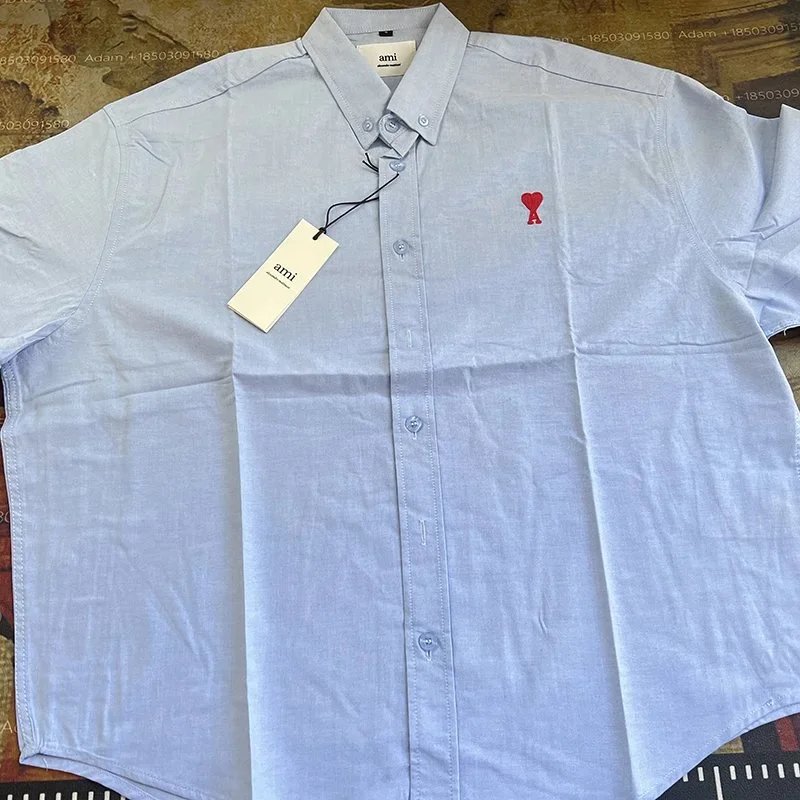 AMI Paris Light Blue Button-Up Shirt with Red Logo