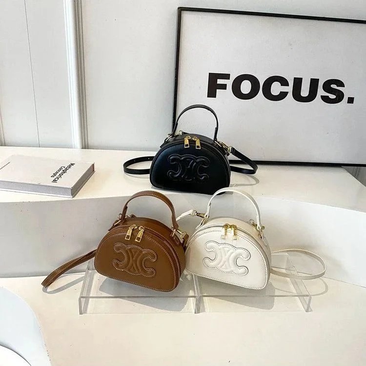 Celine Mini Half Moon Bag in Black Brown White