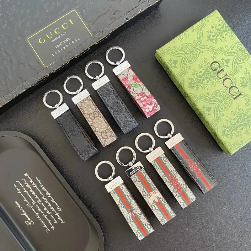 Gucci Keychains with Signature Patterns and Leather Straps